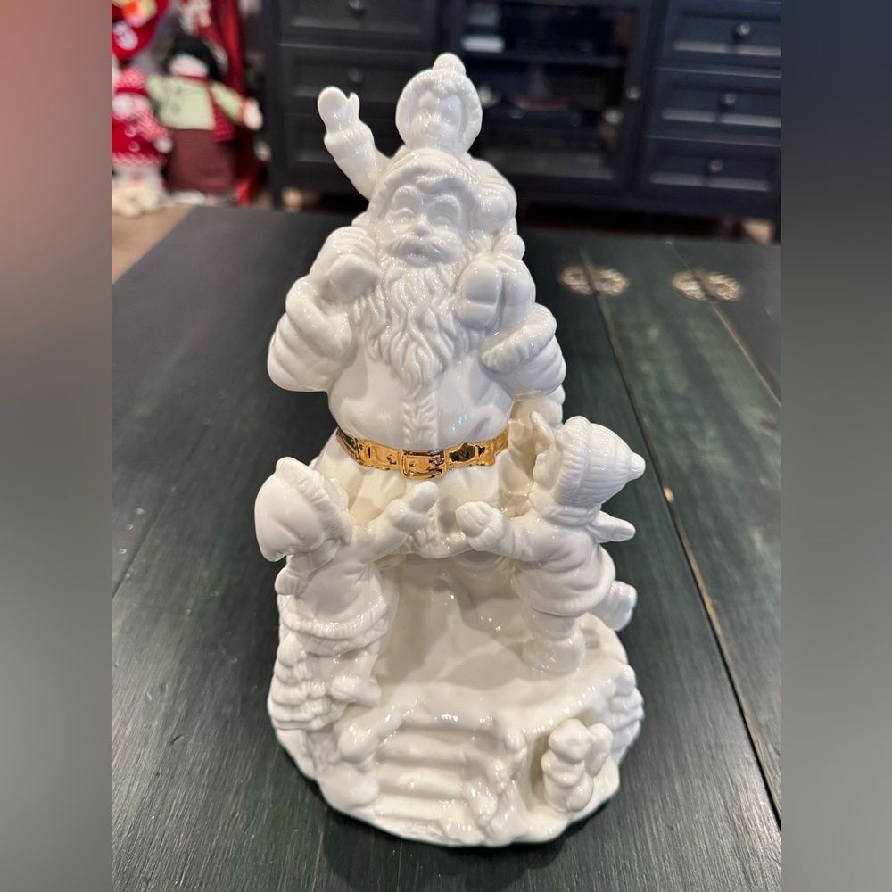 Ceramic Winter White and Gold Santa Claus Playing with Children Figurine Holiday